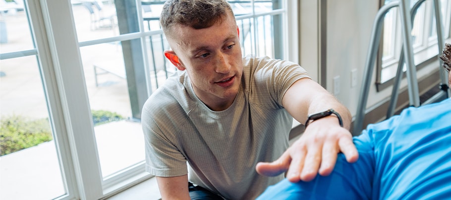 Hemophilia A patient, Zach Mullins, training with a client