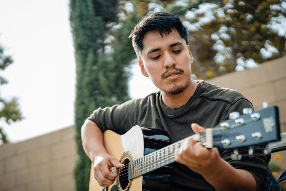 Hemophilia A patient, Daniel Cruz, playing guitar